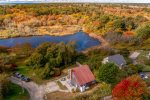 Aerial view of the home and Cedar Swamp Pond